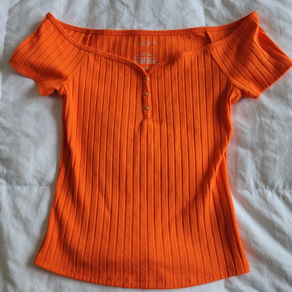 Bright orange shirt with buttons